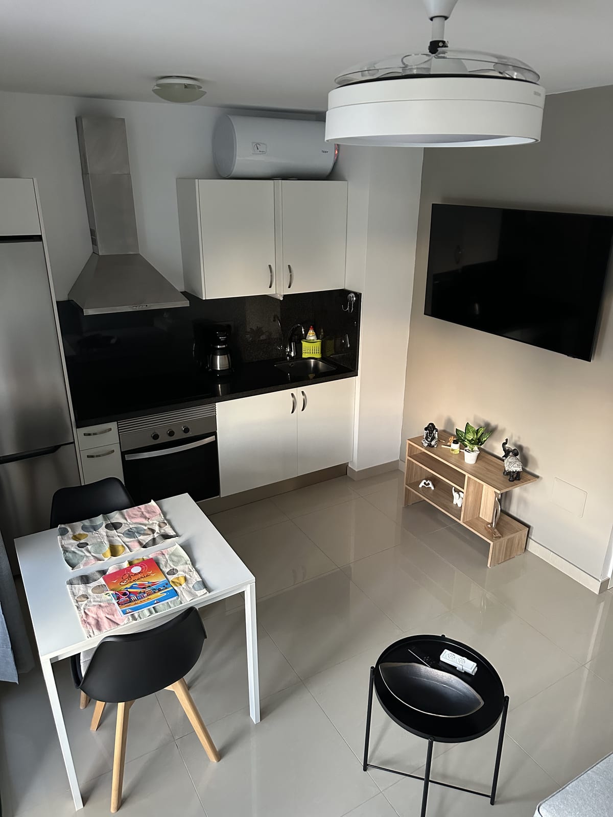 View of the kitchen and living area at Cozy Apartment Maspalomas