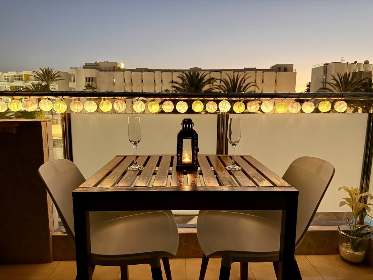 Apartment Two's private balcony at dusk