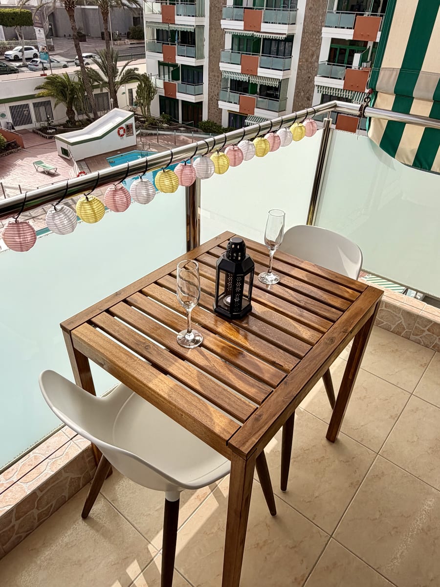 View of the community pool from Apartment Two's terrace